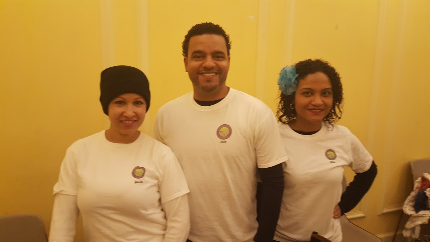 Our three staff, all wearing white Esperanza-Hope shirt