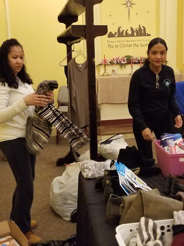 Our female staffs folding clothes
