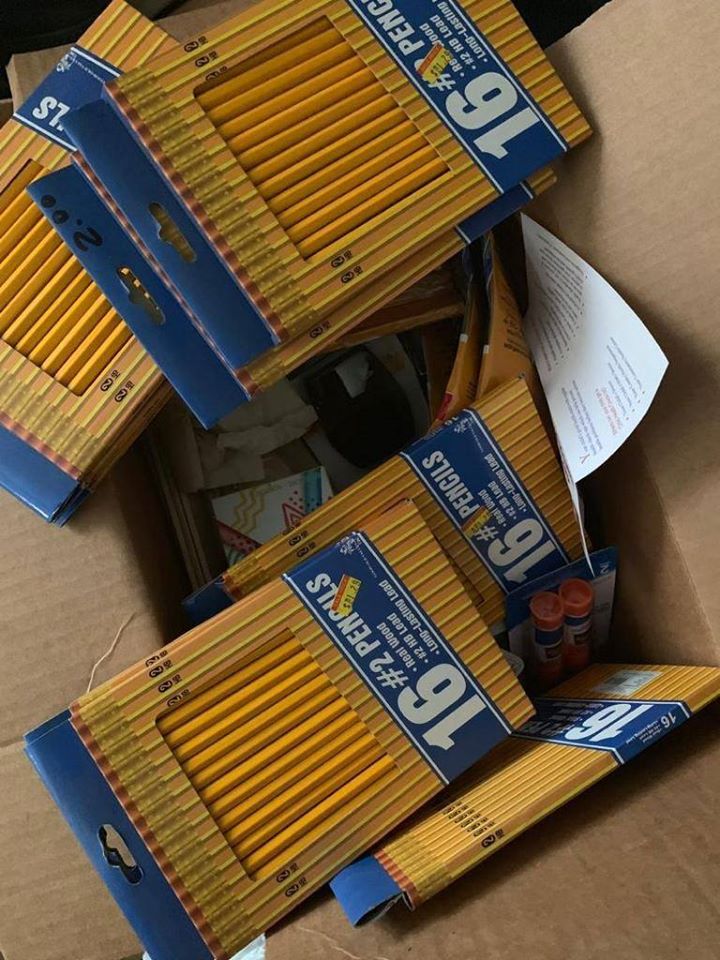 An open box full of boxes of pencils