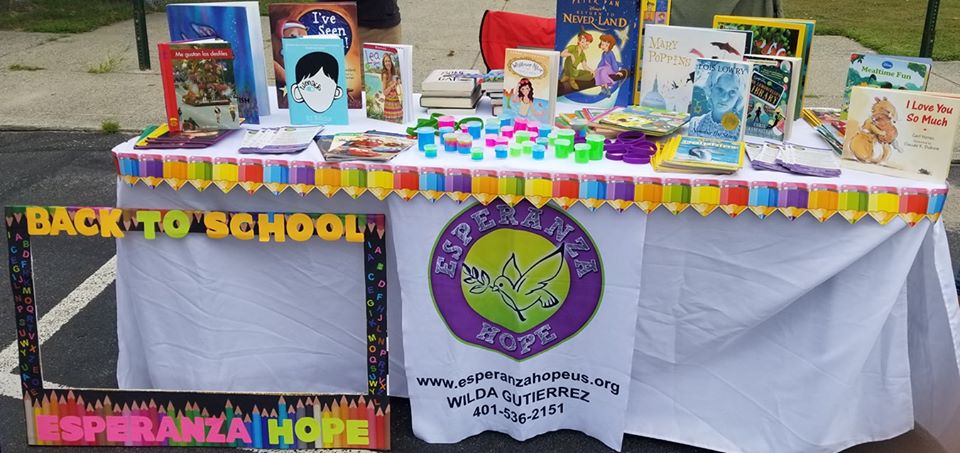 A table full of children’s books and toys and the colorful “Back to School” frame (2)