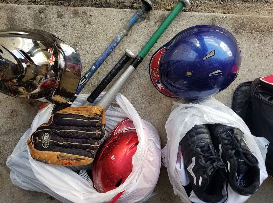 Helmets, gloves, bats, and a pair of shoes