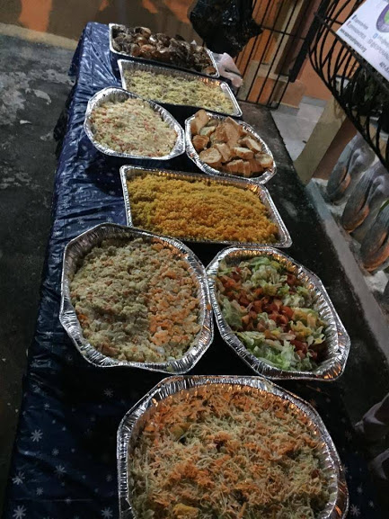 A table full of different dishes for serving