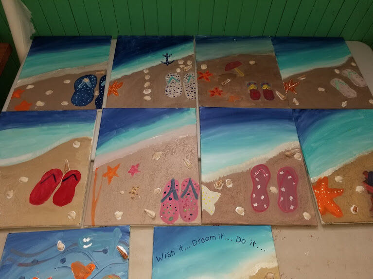 10 paintings of seashore with slippers