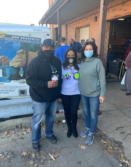 Three of our staff, all wearing masks