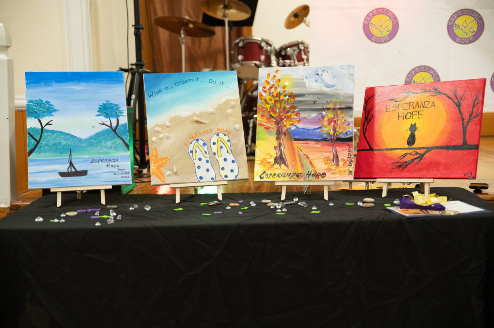 Four paintings made by Esperanza-Hope