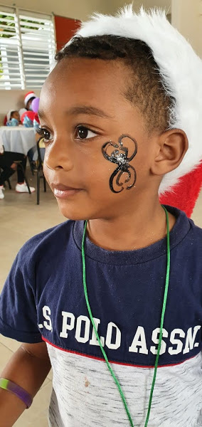 A boy with a painted design on his face